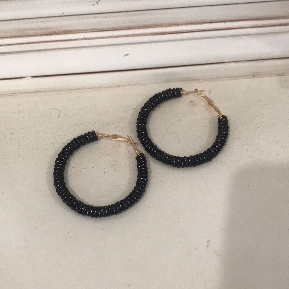 Black beaded hoop earrings
